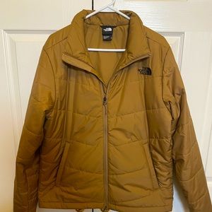The North Face Puffy Jacket. Brown in color and medium in size.